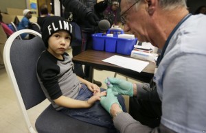 A child getting tested by a nurse